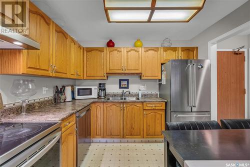 210 217A Cree Place, Saskatoon, SK - Indoor Photo Showing Kitchen With Double Sink