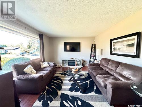 1055 3Rd Street E, Prince Albert, SK - Indoor Photo Showing Living Room With Fireplace