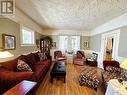 219 21St Street W, Prince Albert, SK  - Indoor Photo Showing Living Room 