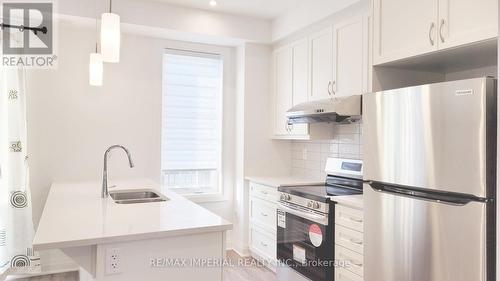 34 - 1317 Leriche Way, Milton, ON - Indoor Photo Showing Kitchen With Stainless Steel Kitchen With Double Sink With Upgraded Kitchen