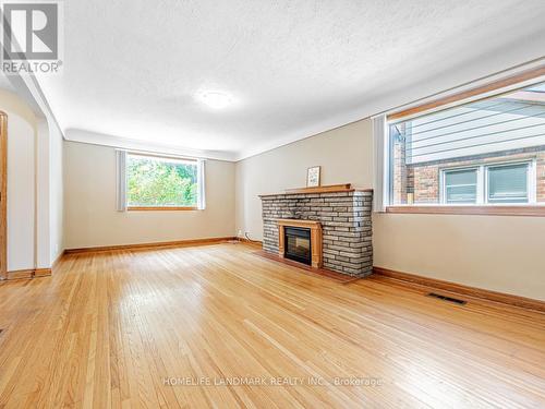 113 Harmony Road N, Oshawa (Eastdale), ON - Indoor Photo Showing Living Room With Fireplace