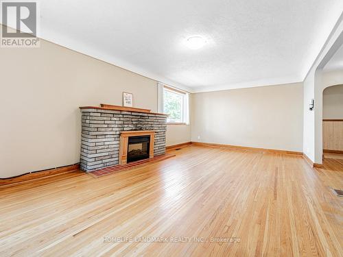 113 Harmony Road N, Oshawa (Eastdale), ON - Indoor Photo Showing Living Room With Fireplace