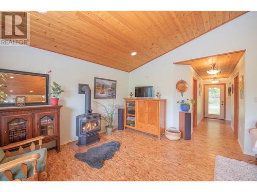 65 Pine Road, Cherryville, BC - Indoor With Fireplace