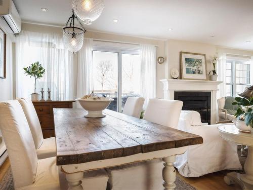 Dining room - 22 Ch. Du Hudson Club, Rigaud, QC - Indoor Photo Showing Dining Room With Fireplace