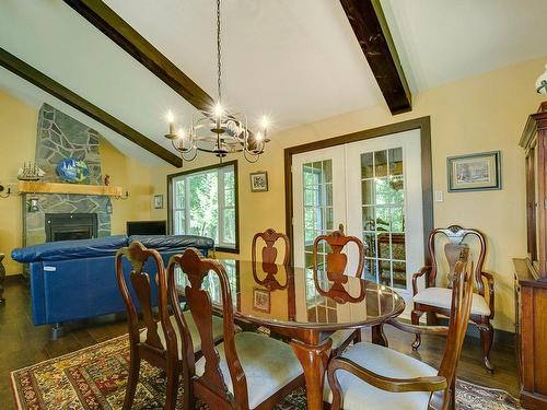 Salle Ã  manger - 568 Ch. Du Poète, Prévost, QC - Indoor Photo Showing Dining Room With Fireplace