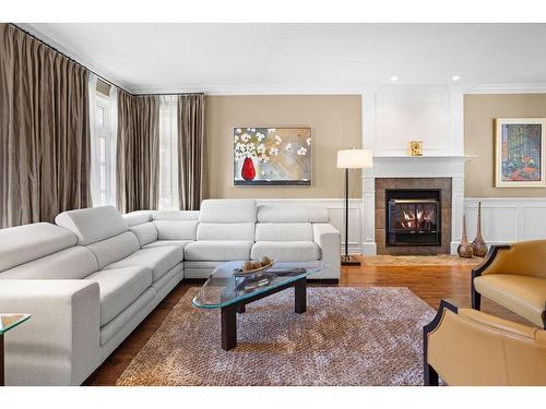 Living room - 7 Rue De Rambouillet, Blainville, QC - Indoor Photo Showing Living Room With Fireplace