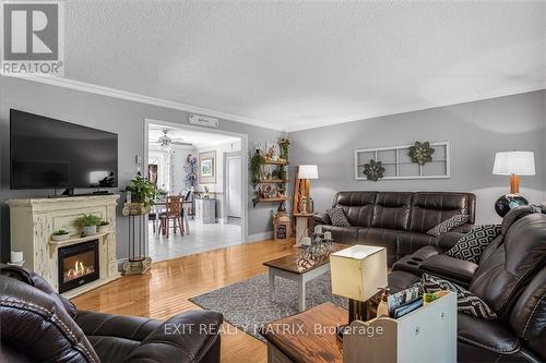 1574 Sandy Hill Road, Champlain, ON - Indoor Photo Showing Living Room With Fireplace