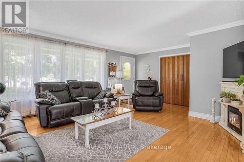 1574 Sandy Hill Road, Champlain, ON - Indoor Photo Showing Living Room With Fireplace