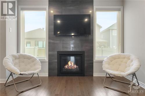 1209 Cavallo Street, Ottawa, ON - Indoor Photo Showing Living Room With Fireplace