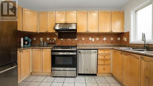 25 Redcastle Street, Brampton (Fletcher'S Meadow), ON - Indoor Photo Showing Kitchen With Double Sink