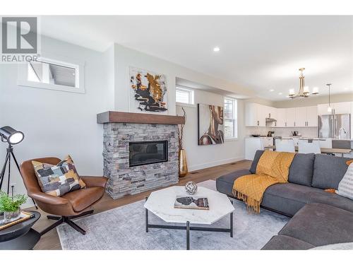 1473 Tower Ranch Drive, Kelowna, BC - Indoor Photo Showing Living Room With Fireplace