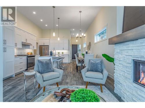 1432 Tower Ranch Drive, Kelowna, BC - Indoor Photo Showing Living Room With Fireplace