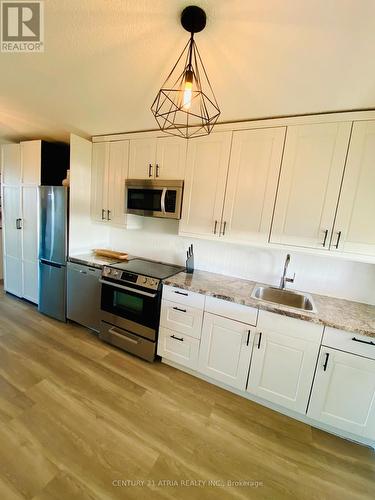 720 - 4645 Jane Street, Toronto (Black Creek), ON - Indoor Photo Showing Kitchen