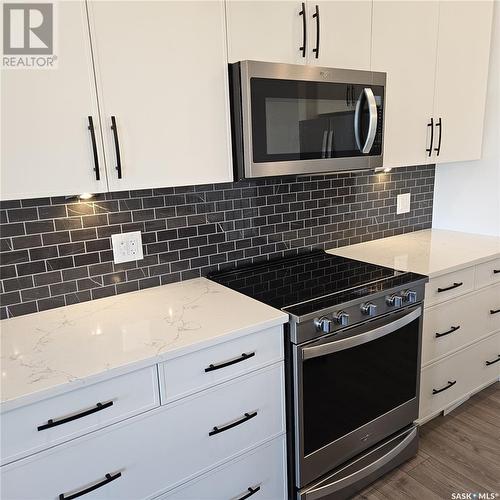 31 310 Evergreen Boulevard, Saskatoon, SK - Indoor Photo Showing Kitchen With Upgraded Kitchen