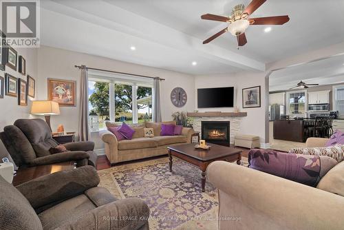 542 Lily Lake Road, Smith-Ennismore-Lakefield, ON - Indoor Photo Showing Living Room With Fireplace