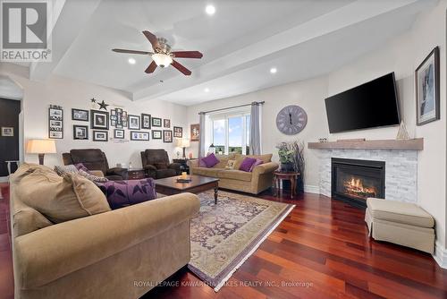 542 Lily Lake Road, Smith-Ennismore-Lakefield, ON - Indoor Photo Showing Living Room With Fireplace