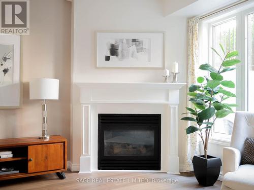 925 - 16 Laidlaw Street, Toronto (South Parkdale), ON - Indoor Photo Showing Living Room With Fireplace