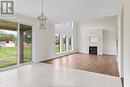 657 Orchards Crescent, Windsor, ON  - Indoor Photo Showing Living Room With Fireplace 