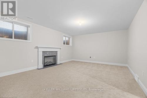 112 Leneve Street, Lambton Shores (Forest), ON - Indoor Photo Showing Other Room With Fireplace