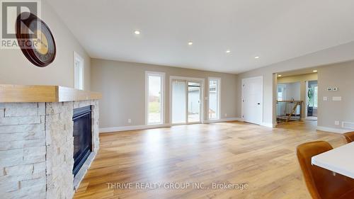 1559 Elmtree Drive, North Middlesex (Parkhill), ON - Indoor Photo Showing Living Room With Fireplace