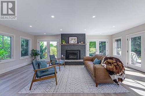 1680 Hwy 26, Springwater, ON - Indoor Photo Showing Living Room With Fireplace