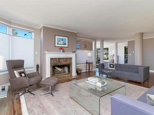 5301-2829 Arbutus Rd, Saanich, BC - Indoor Photo Showing Living Room With Fireplace