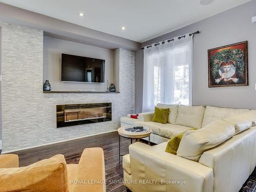 235 Bain Ave, Toronto, ON - Indoor Photo Showing Living Room With Fireplace