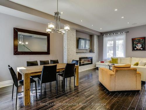 235 Bain Ave, Toronto, ON - Indoor Photo Showing Other Room With Fireplace