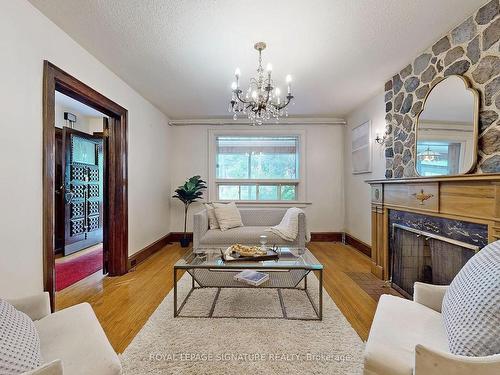 113 Humbercrest Blvd, Toronto, ON - Indoor Photo Showing Living Room With Fireplace