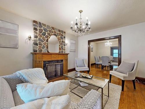 113 Humbercrest Blvd, Toronto, ON - Indoor Photo Showing Living Room With Fireplace