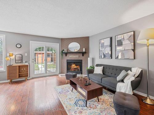 3193 Osbourne Rd, Mississauga, ON - Indoor Photo Showing Living Room With Fireplace