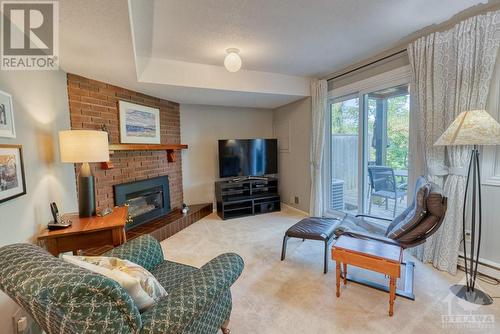 655 Richmond Road Unit#34, Ottawa, ON - Indoor Photo Showing Living Room With Fireplace