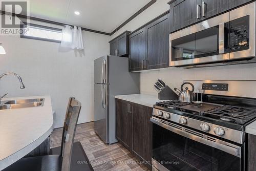 Cv003 - 657 Thunder Bridge Road, Kawartha Lakes, ON - Indoor Photo Showing Kitchen With Double Sink