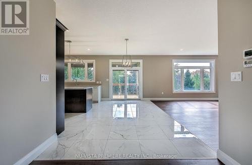 51 Basil Crescent, Middlesex Centre (Ilderton), ON - Indoor Photo Showing Other Room With Fireplace