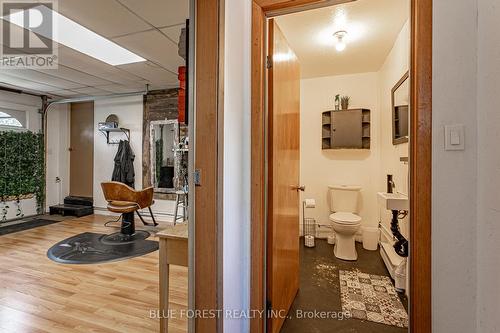 finished garage space - 8945 Hacienda Road, Aylmer (Ay), ON - Indoor Photo Showing Bathroom