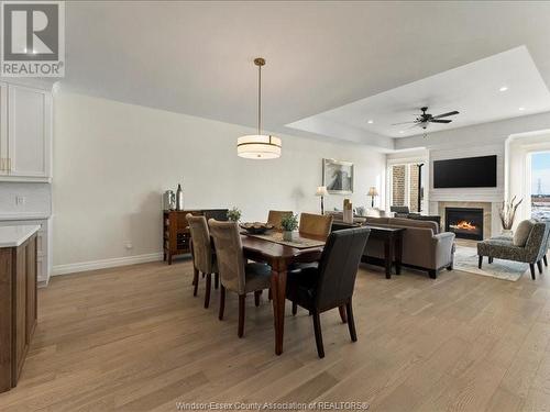 3285 Tullio Drive, Lasalle, ON - Indoor Photo Showing Dining Room With Fireplace