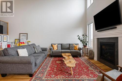 21 Lang Lane, East Luther Grand Valley, ON - Indoor Photo Showing Living Room With Fireplace