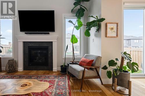 21 Lang Lane, East Luther Grand Valley, ON - Indoor Photo Showing Living Room With Fireplace