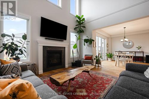 21 Lang Lane, East Luther Grand Valley, ON - Indoor Photo Showing Living Room With Fireplace