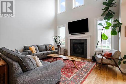 21 Lang Lane, East Luther Grand Valley, ON - Indoor Photo Showing Living Room With Fireplace