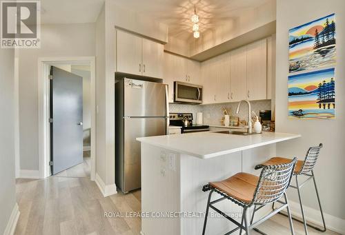 405 - 111 Worsley Street, Barrie (City Centre), ON - Indoor Photo Showing Kitchen With Stainless Steel Kitchen