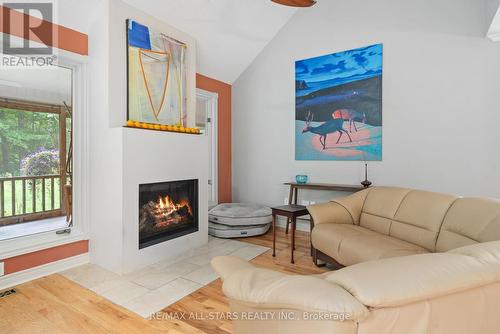 11 Aneva Court, Kawartha Lakes, ON - Indoor Photo Showing Living Room With Fireplace