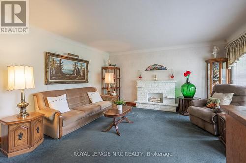 11 Brisbane Glen, St. Catharines, ON - Indoor Photo Showing Living Room With Fireplace