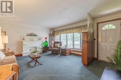 11 Brisbane Glen, St. Catharines, ON - Indoor Photo Showing Living Room With Fireplace