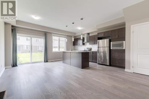 128 Sonoma Lane, Hamilton (Winona), ON - Indoor Photo Showing Kitchen With Upgraded Kitchen