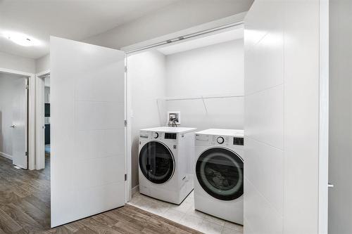 138 Ken Wong Bay, Winnipeg, MB - Indoor Photo Showing Laundry Room