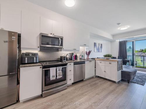 318-3655 Kingston Rd, Toronto, ON - Indoor Photo Showing Kitchen With Stainless Steel Kitchen