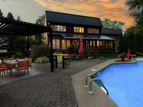 Back facade - 356B Ch. Du Richelieu, Saint-Basile-Le-Grand, QC - Outdoor With In Ground Pool With Deck Patio Veranda