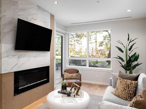 101-1201 Fort St, Victoria, BC - Indoor Photo Showing Living Room With Fireplace