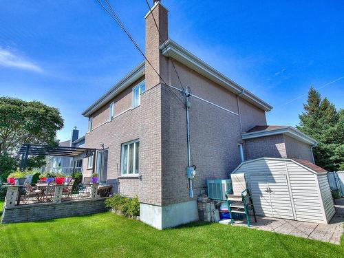 Backyard - 265 Rue Maupassant, Dollard-Des-Ormeaux, QC - Outdoor With Exterior